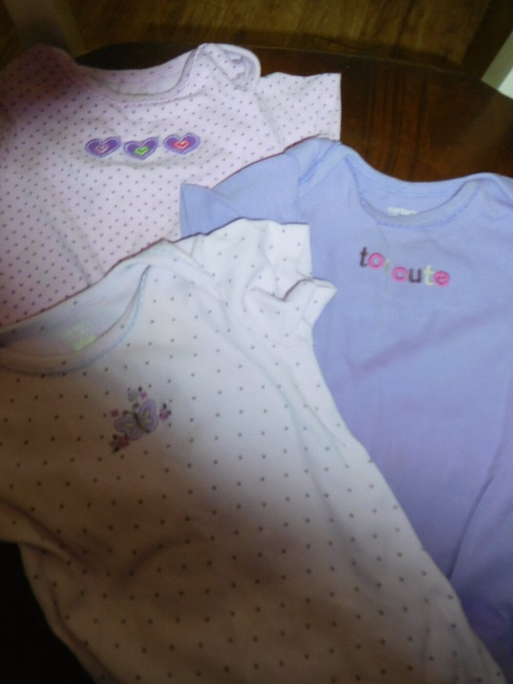 Bundle of 4 Onsies ( 9 mos)